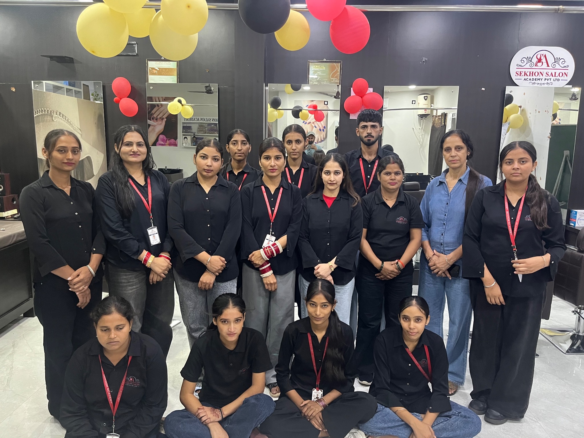 Sekhon Salon Academy students gathered in the academy wearing their uniforms